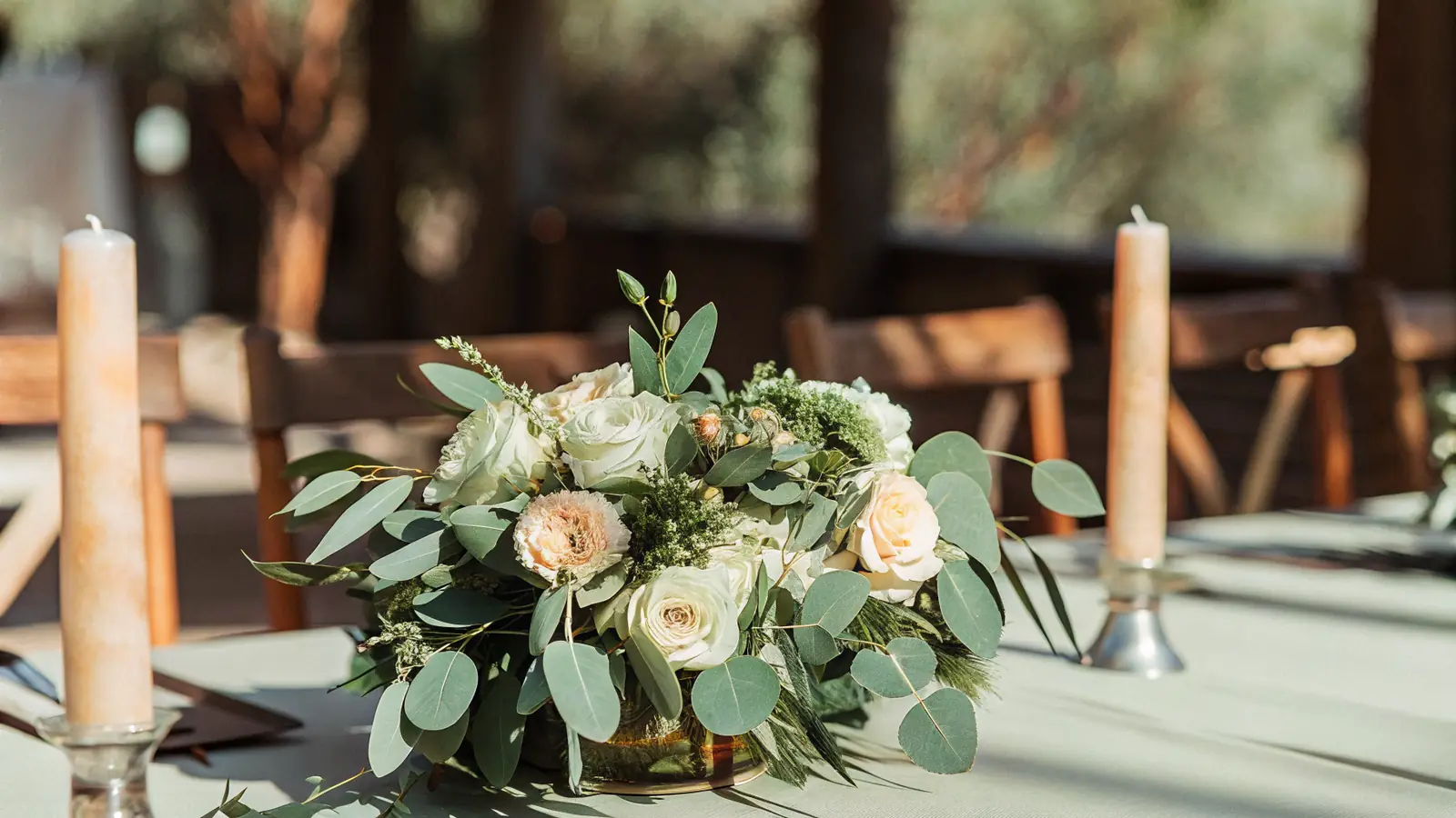 Lush wedding florals and table styling in soft tones